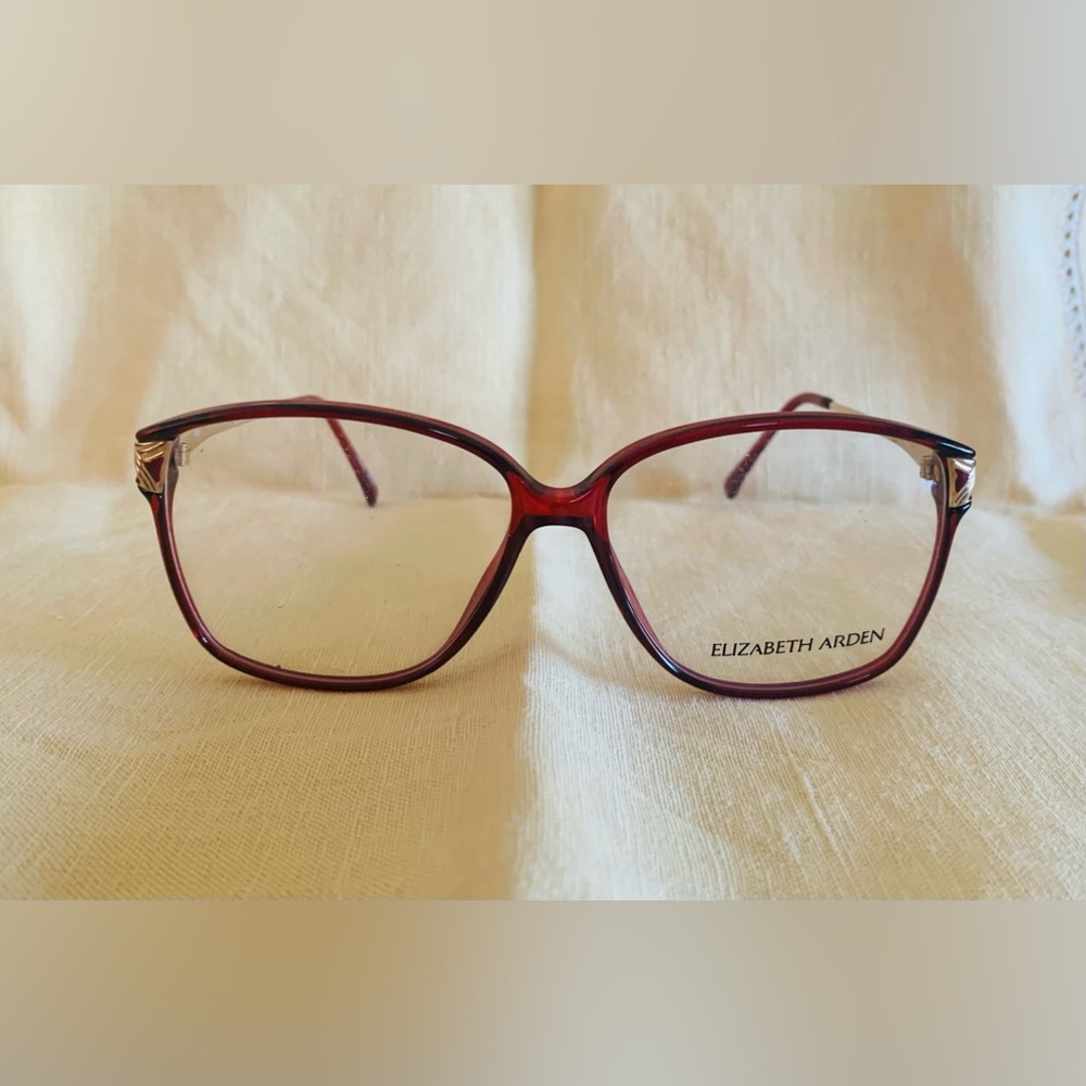 Elizabeth Arden red eyeglasses, golden arms, new without tag, very light frame